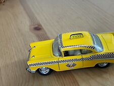 Kinsmart 140 1957 Chevy Bel Air Yellow Taxi Pull Go Die Cast Car Opening Doors